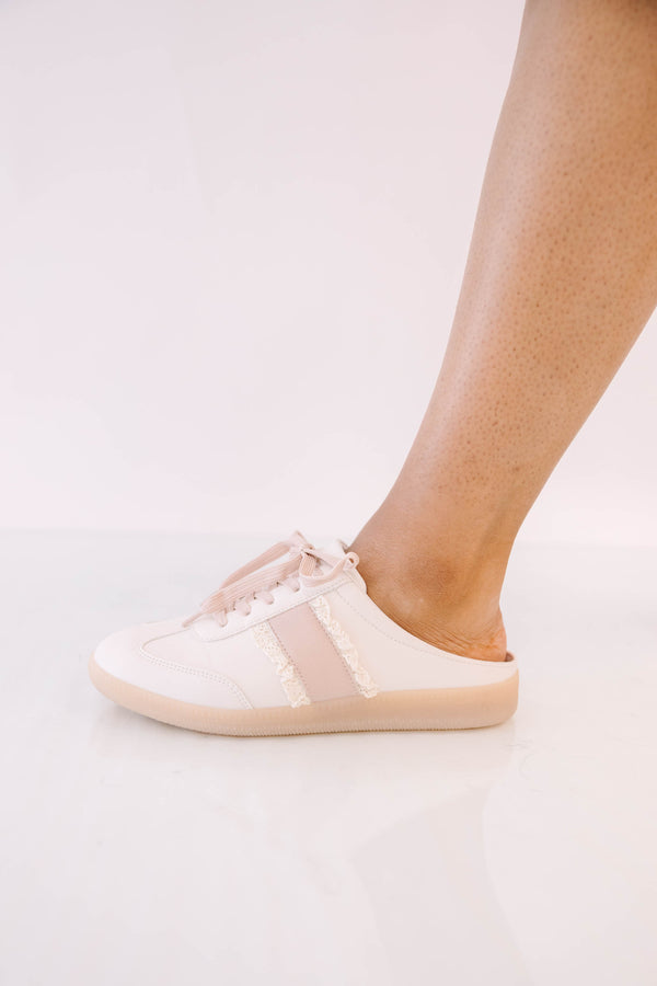 Plus Size pink backless mule sneakers with lace-up front, frayed trim, and tan rubber soles.
