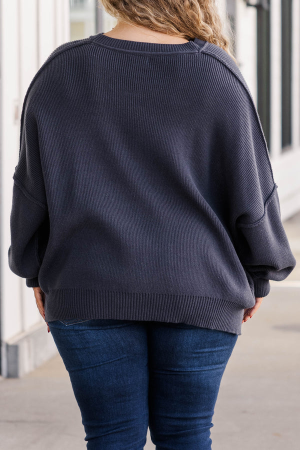 Chic Soul plus size clothing, charcoal colored shorter length sweater with slight bubble sleeves and outward seams