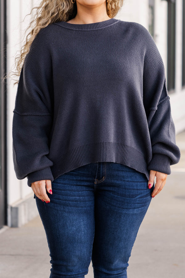 Chic Soul plus size clothing, charcoal colored shorter length sweater with slight bubble sleeves and outward seams