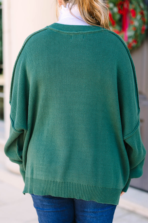 Plus Size emerald green oversized ribbed knit sweater with a crew neckline and drop shoulders.