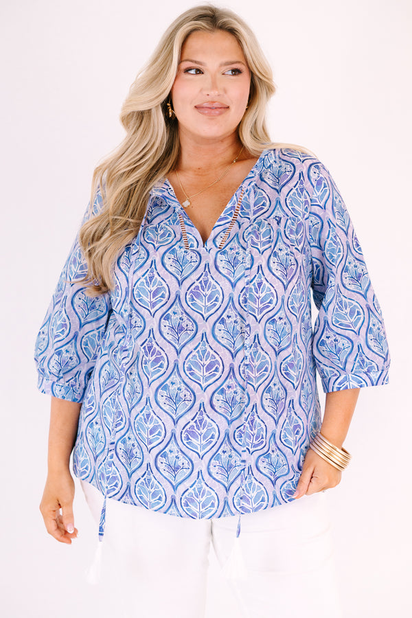 Chic Soul plus size clothing, light purple and dark blue pattered v neck 1/2 sleeve top with puff sleeves and drawstrings hanging from the neckline