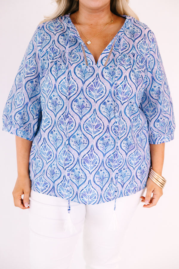 Chic Soul plus size clothing, light purple and dark blue pattered v neck 1/2 sleeve top with puff sleeves and drawstrings hanging from the neckline