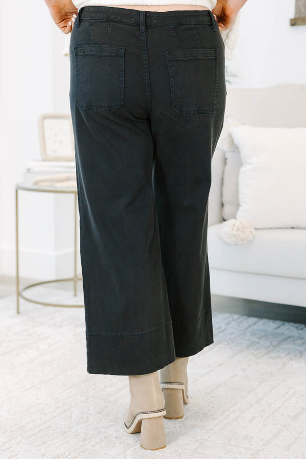 Plus Size black wide-leg jeans with front seam detailing and a cropped hem.