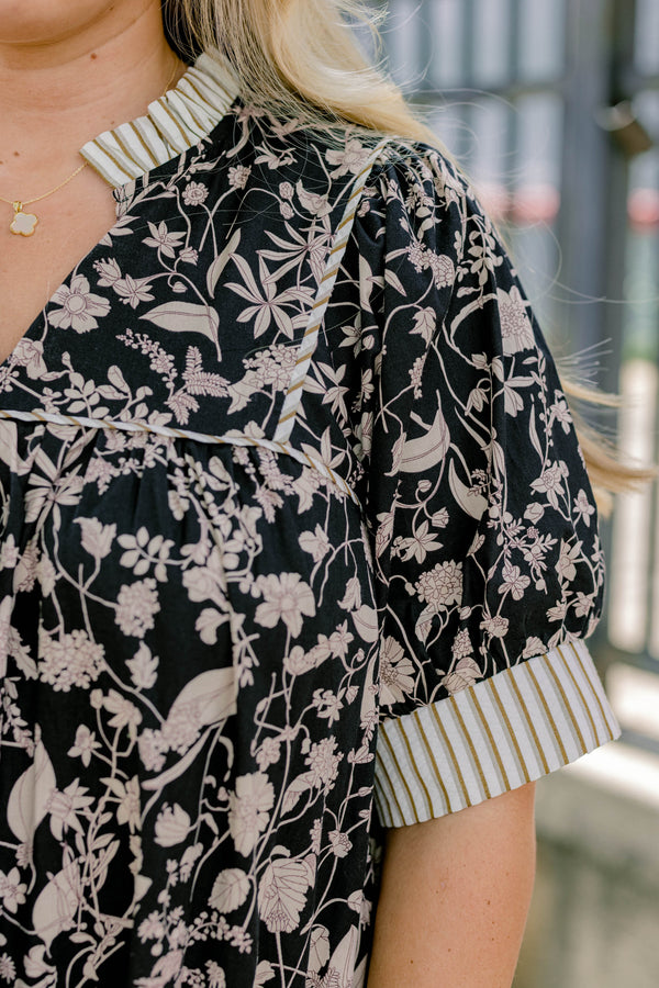Chic Soul plus size clothing, black and crem floral print dress with cream striped trim on the collar and around the sleeves