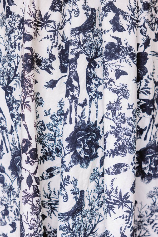 Chic Soul plus size clothing, black and white toile print short tiered puff sleeve dress with a subtle v neckline and black bows on the sleeves