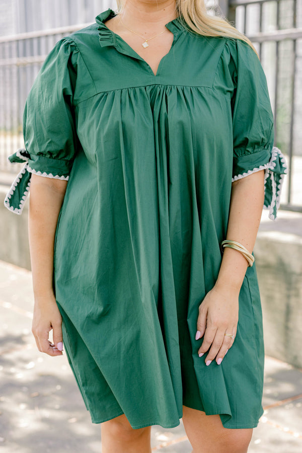 Chic Soul plus size clothing, dark green short puff sleeve flowy dress with white embroidered ties on the sleeves in bows