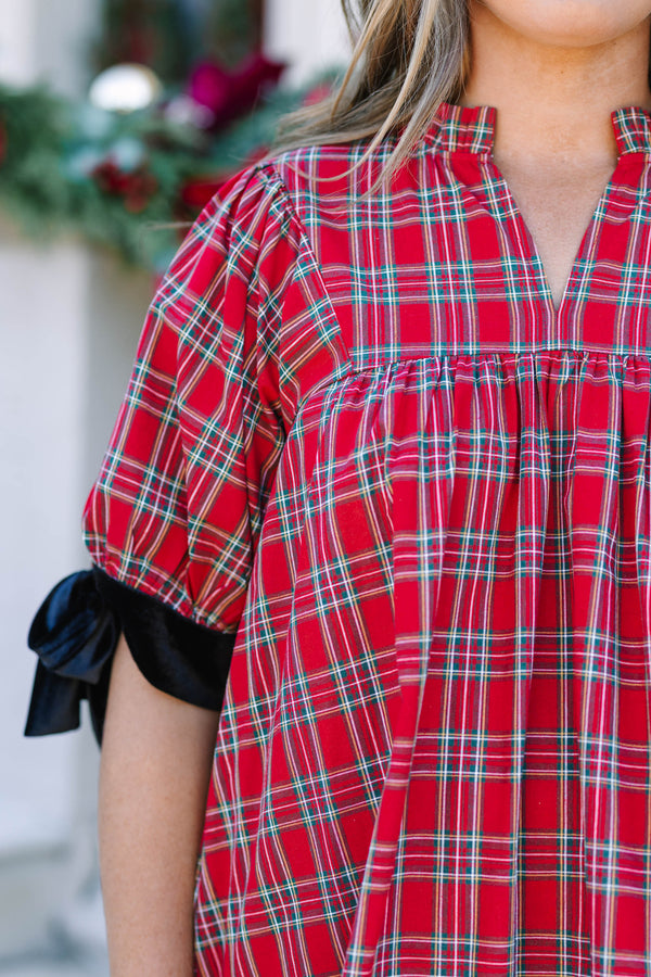Plus Size red plaid babydoll dress with puff sleeves and black velvet bow details.