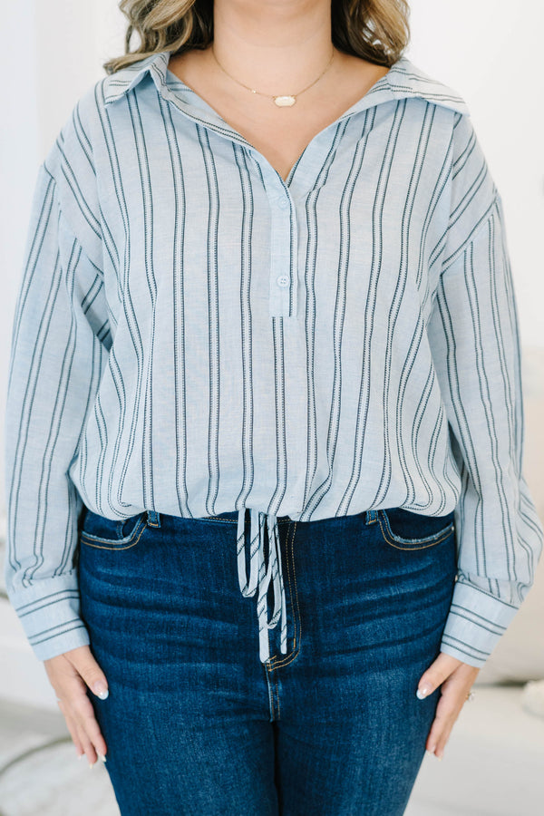 Plus Size blue and white vertical striped 100% cotton top with long sleeves and a tie-front hem.