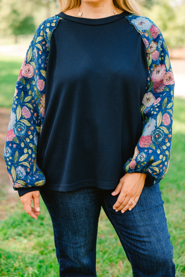 Chic Soul plus size clothing, navy blue long sleeve top with pink, blue, and green floral patterned sleeves