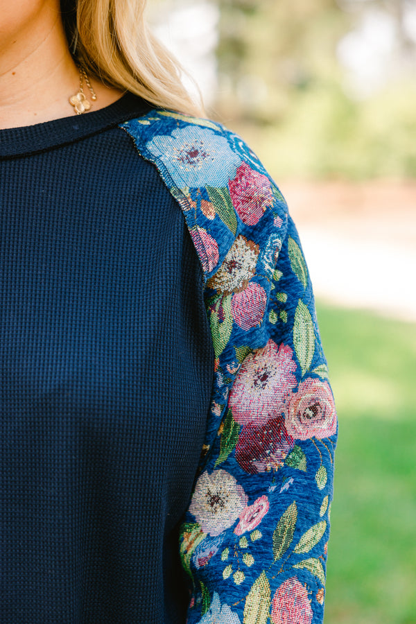 Chic Soul plus size clothing, navy blue long sleeve top with pink, blue, and green floral patterned sleeves