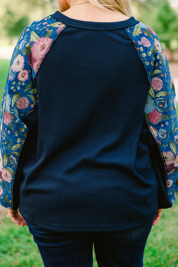 Chic Soul plus size clothing, navy blue long sleeve top with pink, blue, and green floral patterned sleeves