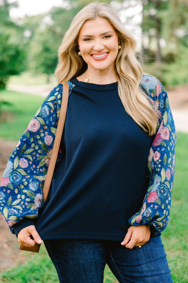 Chic Soul plus size clothing, navy blue long sleeve top with pink, blue, and green floral patterned sleeves