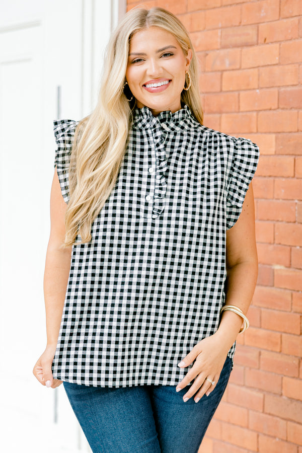 Chic Soul plus size clothing, black gingham top with flutter sleeves and a ruffle detail going down to the chest and on the collar 