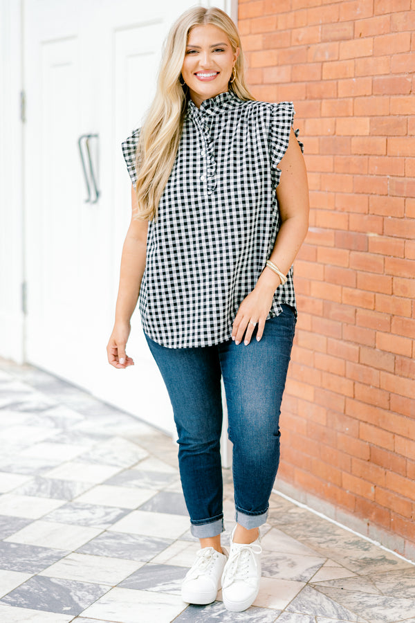 Chic Soul plus size clothing, black gingham top with flutter sleeves and a ruffle detail going down to the chest and on the collar 