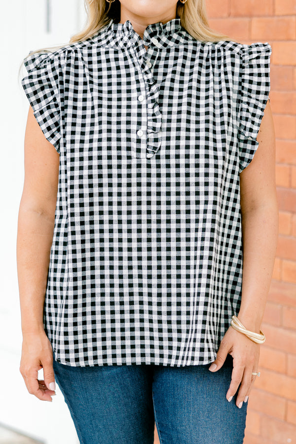 Chic Soul plus size clothing, black gingham top with flutter sleeves and a ruffle detail going down to the chest and on the collar 