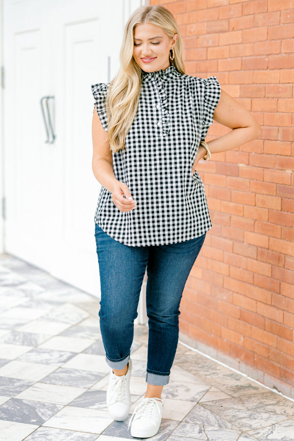 Chic Soul plus size clothing, black gingham top with flutter sleeves and a ruffle detail going down to the chest and on the collar 