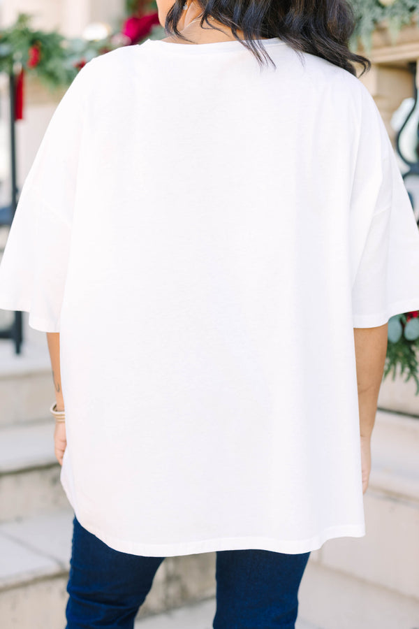 Plus Size white boyfriend tee with a green Christmas tree graphic and pink striped background.