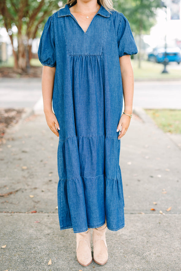Plus size dark denim tiered maxi dress with a flowy fit, V-neckline, and short puff sleeves.