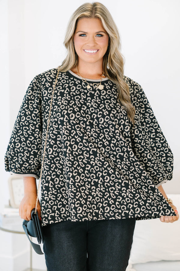 Plus Size leopard jacquard top with elastic puff sleeves, a crew neckline, and a relaxed fit.