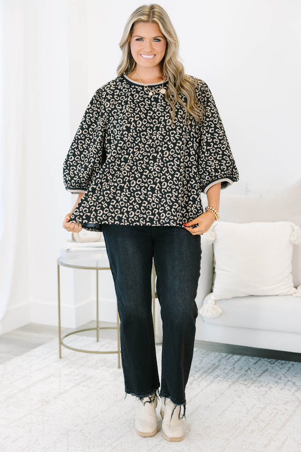 Plus Size leopard jacquard top with elastic puff sleeves, a crew neckline, and a relaxed fit.