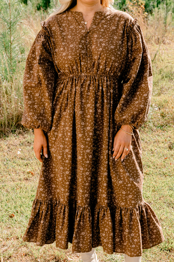 Chic Soul plus size clothing, brown long sleeve flowy maxi dress with small white floral print and cinched at the waist and ends of the sleeves and with a v-cutout on the neck