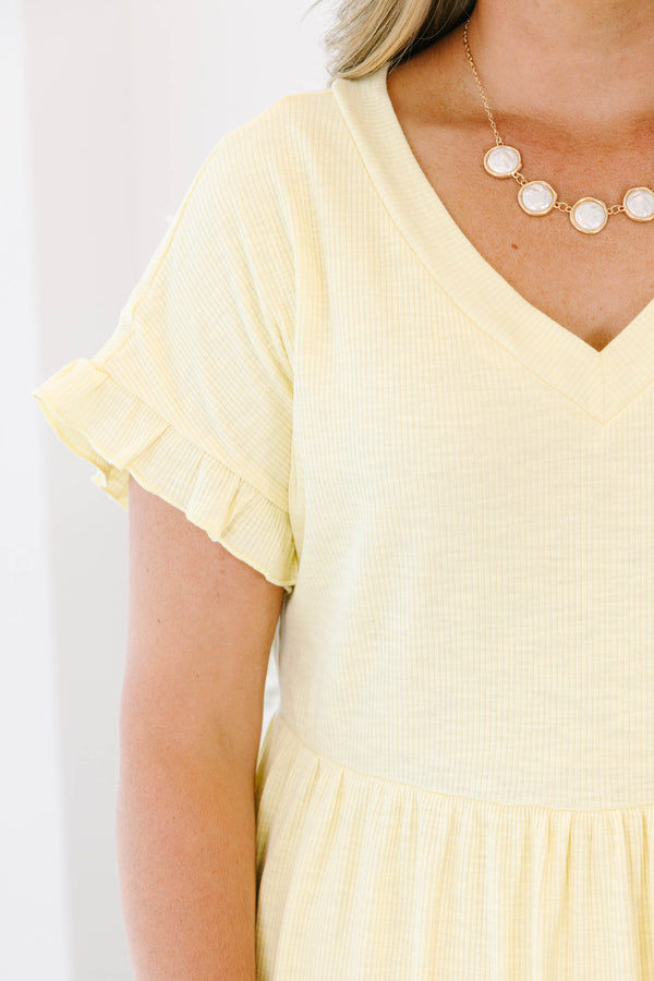 Plus Size yellow textured cotton dress with a V-neckline and ruffled short sleeves.
