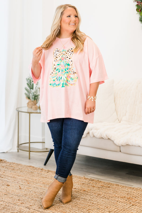 Chic Soul plus size clothing, short-sleeve dusty pink boyfriend tee with scoop-neckline and graphic watercolor christmas tree graphic with white and black polka dotted bow on the top of the tree