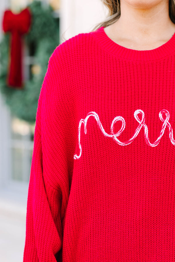 Plus size red oversized knit Merry Little Moment Sweater with white cursive embroidery.