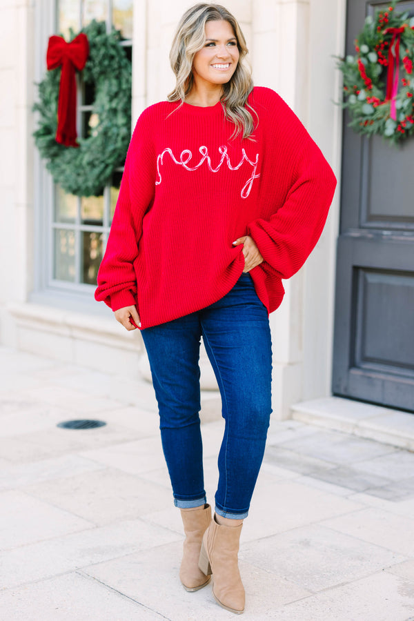 Plus size red oversized knit Merry Little Moment Sweater with white cursive embroidery.
