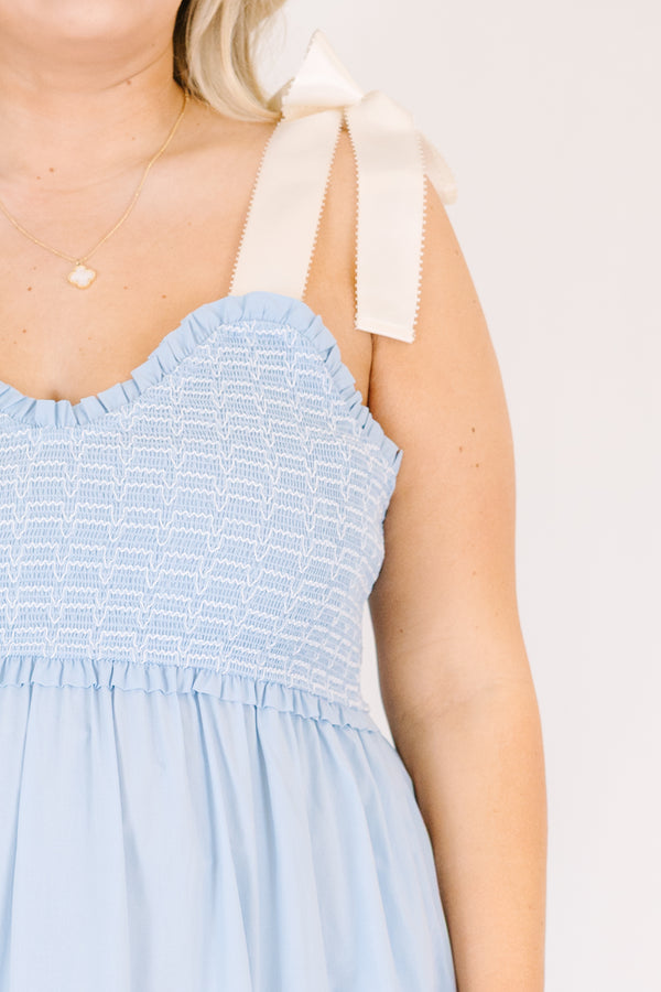 Plus Size ice blue ankle-length dress with a smocked bodice, ruffle trim, and wide ribbon straps.
