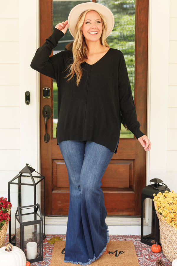 Chic Soul plus size clothing, black sweater with v neckline and textured detail down the center and small slits on the bottom sides