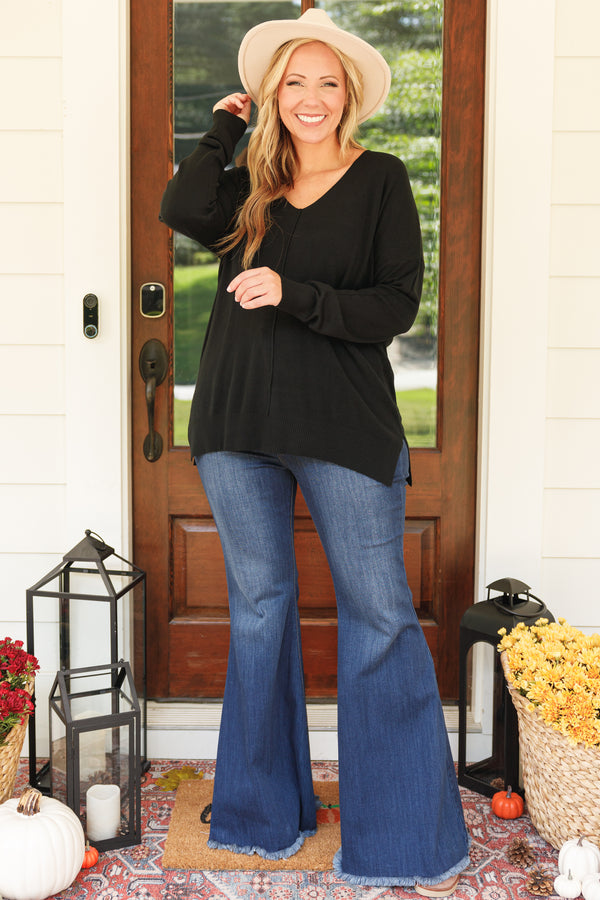 Chic Soul plus size clothing, black sweater with v neckline and textured detail down the center and small slits on the bottom sides