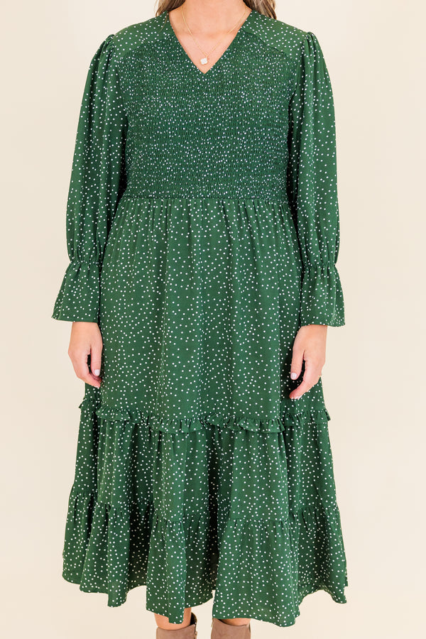 Chic Soul plus size clothing, hunter green long sleeve midi dress with smocked top and ruffle detail along bottom with flare on sleeves with v neckline and white dotted print
