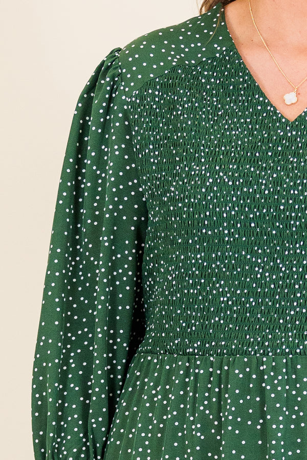 Chic Soul plus size clothing, hunter green long sleeve midi dress with smocked top and ruffle detail along bottom with flare on sleeves with v neckline and white dotted print

