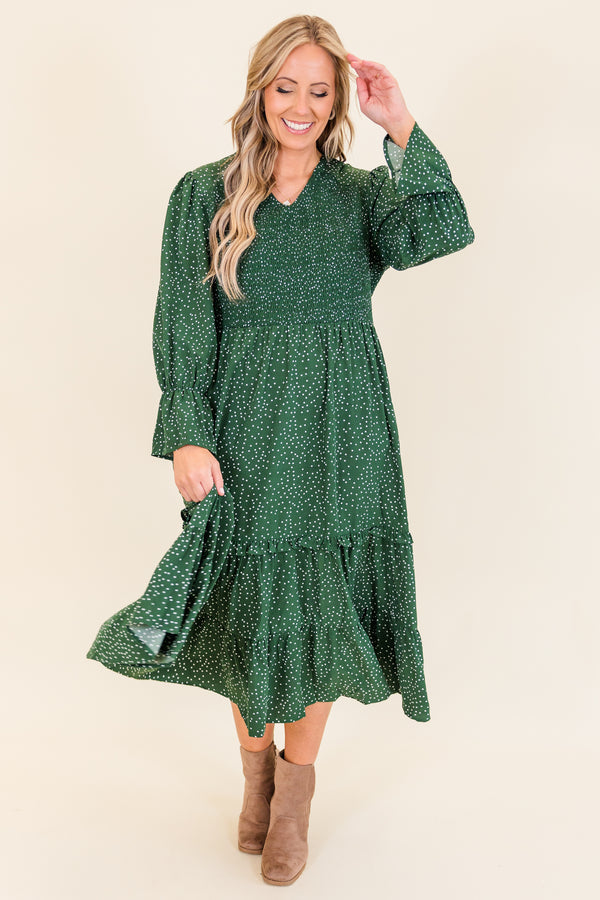 Chic Soul plus size clothing, hunter green long sleeve midi dress with smocked top and ruffle detail along bottom with flare on sleeves with v neckline and white dotted print
