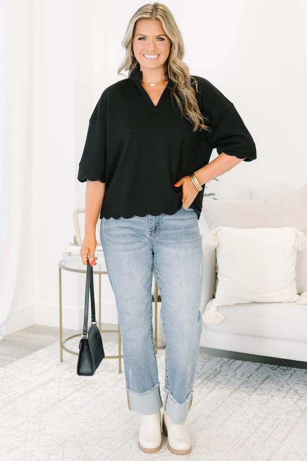Plus Size black v-neck top with a crisp collar and elegant scalloped trim on the sleeves and hem.