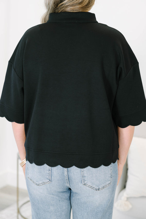 Plus Size black v-neck top with a crisp collar and elegant scalloped trim on the sleeves and hem.