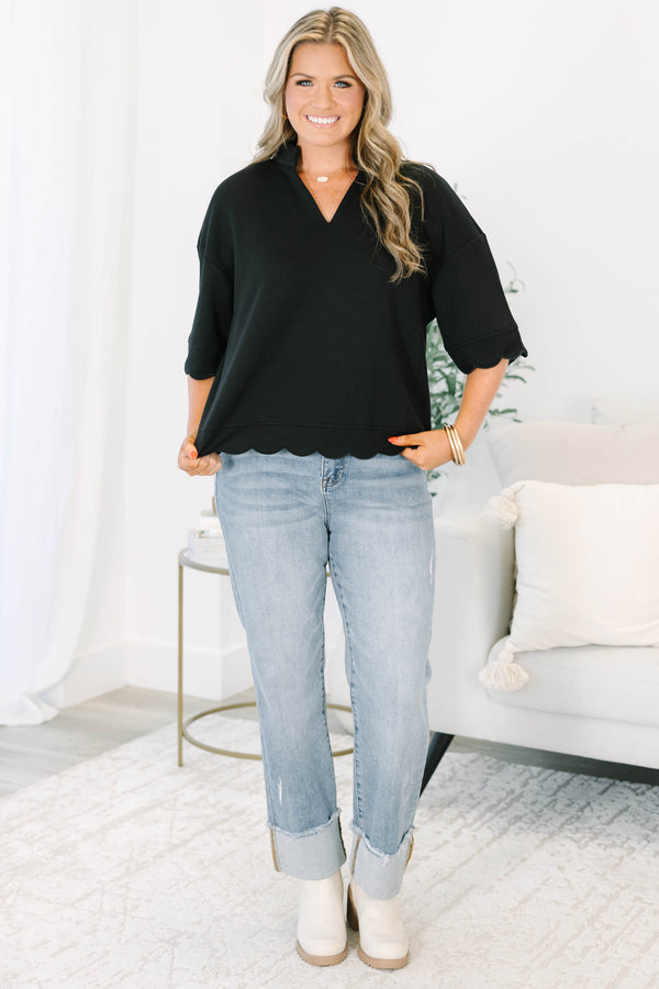 Plus Size black v-neck top with a crisp collar and elegant scalloped trim on the sleeves and hem.
