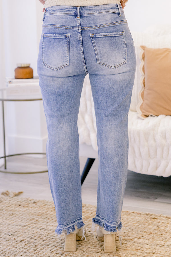 Chic Soul plus size clothing, mid rize medium wash straight leg jeans with a slightly distressed hem