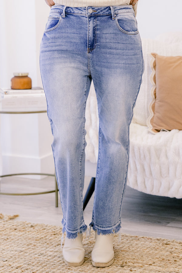 Chic Soul plus size clothing, mid rize medium wash straight leg jeans with a slightly distressed hem