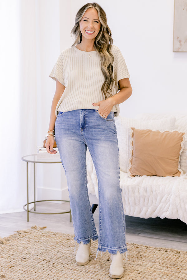 Chic Soul plus size clothing, mid rize medium wash straight leg jeans with a slightly distressed hem