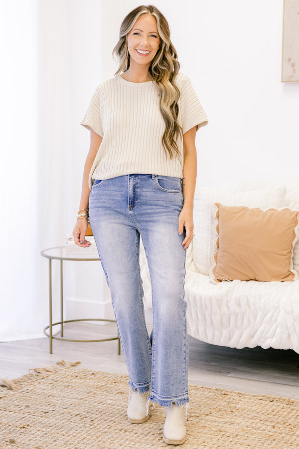 Chic Soul plus size clothing, mid rize medium wash straight leg jeans with a slightly distressed hem