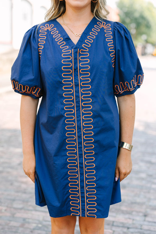 Plus Size blue cotton V-neck dress with orange zigzag embroidery and elastic puff sleeves.