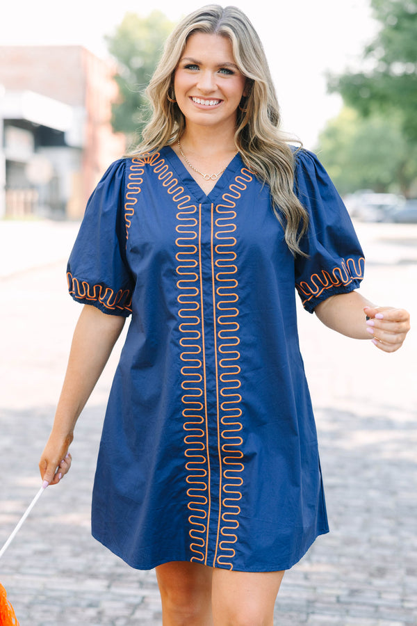 Plus Size blue cotton V-neck dress with orange zigzag embroidery and elastic puff sleeves.