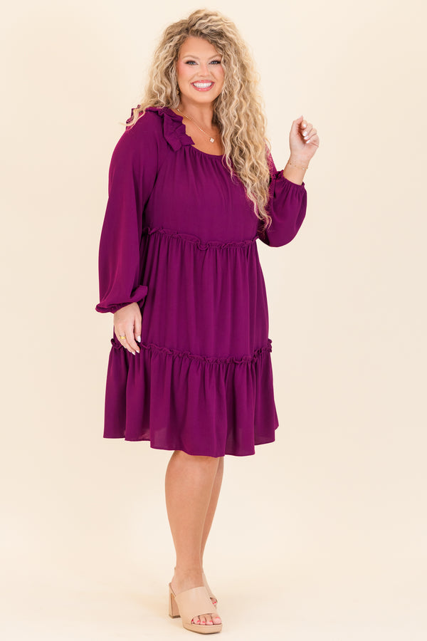 Chic Soul plus size clothing, plum long sleeve mini dress with ruffle tier detailing with round neckline and ruffle detail on shoulders with cuff bubble sleeves