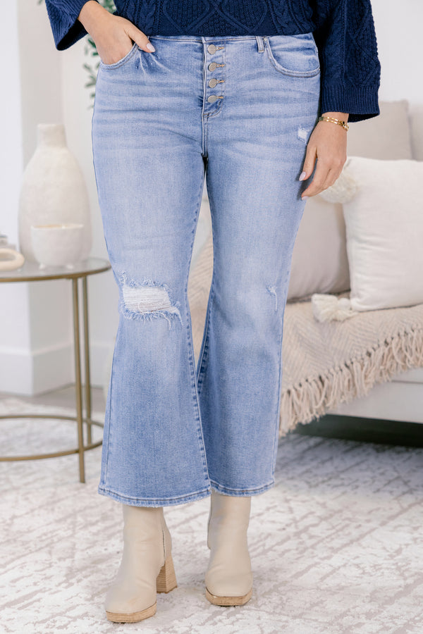 Chic Soul plus size clothing, light wash straight leg jeans with five buttons and distressed rips 