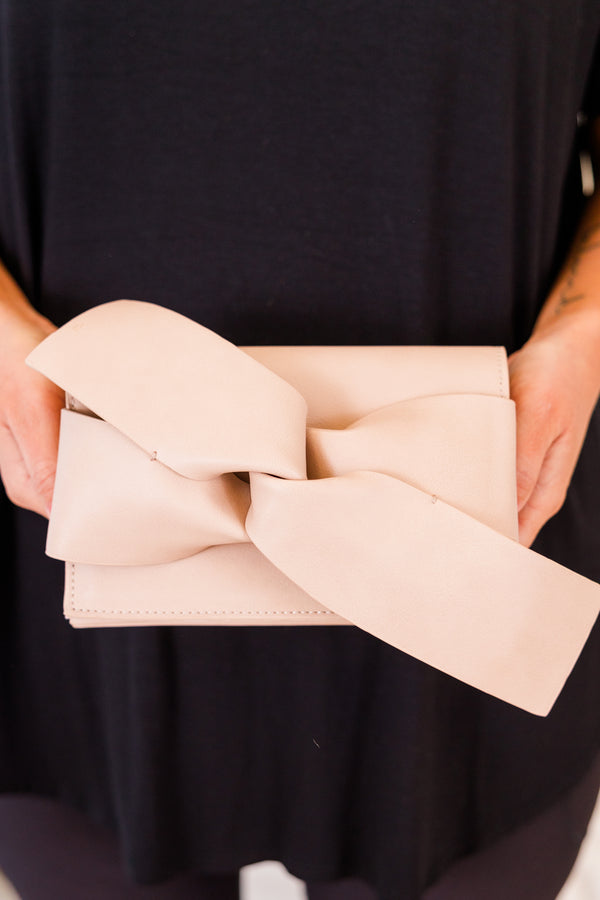 Chic Soul plus size clothing, peach crossbody clutch with bow detail on the front