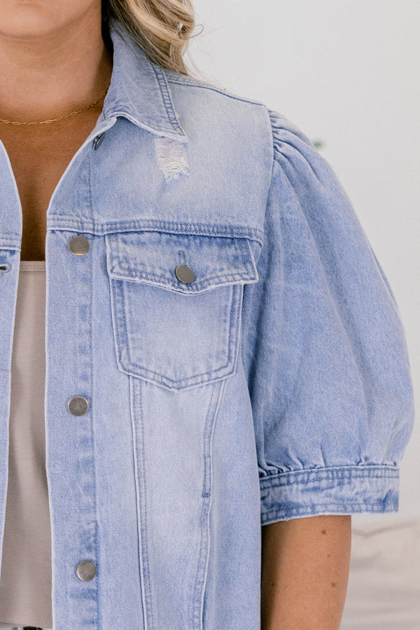 Chic Soul plus size clothing, light denim jean jacket with short bubble sleeves pockets on each side of the chest and buttons going down the center of each side of the jacket 