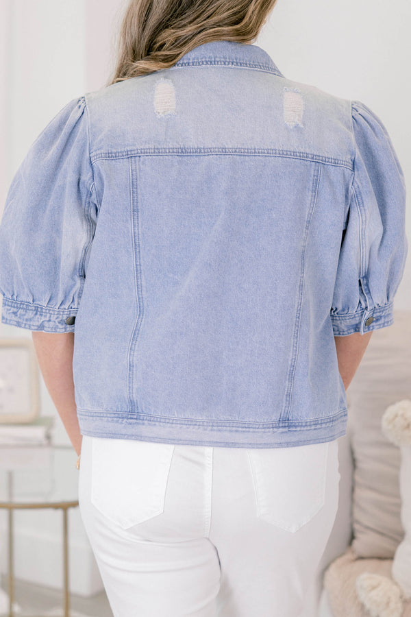 Chic Soul plus size clothing, light denim jean jacket with short bubble sleeves pockets on each side of the chest and buttons going down the center of each side of the jacket 