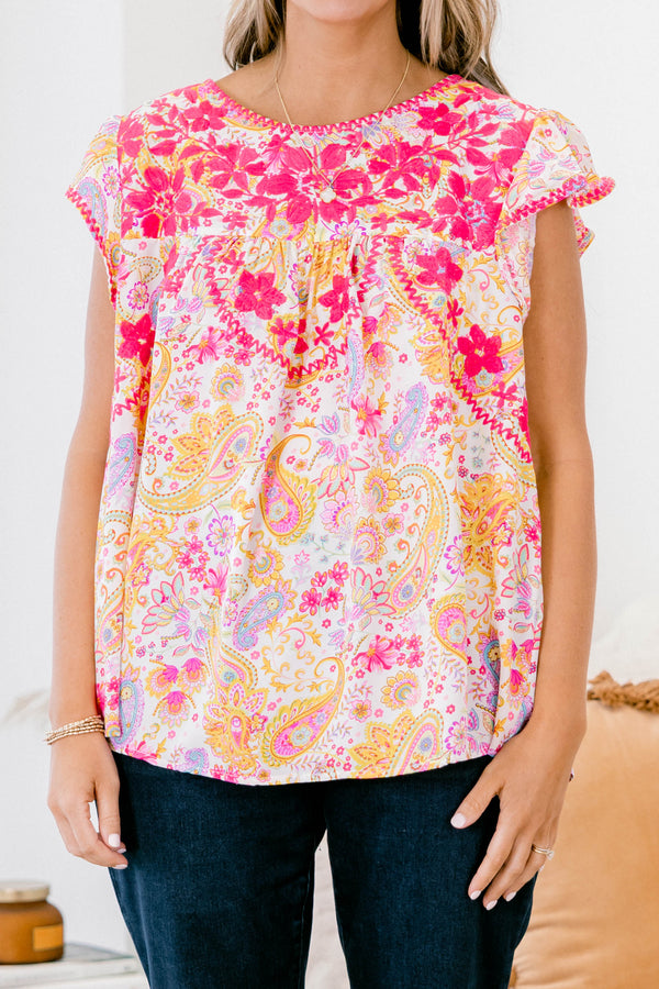 Chic Soul plus size clothing, orange and pink paisley print short flutter sleeve top with pink embroidered details on the chest.